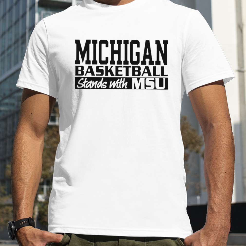 michigan basketball stands with MSU shirt