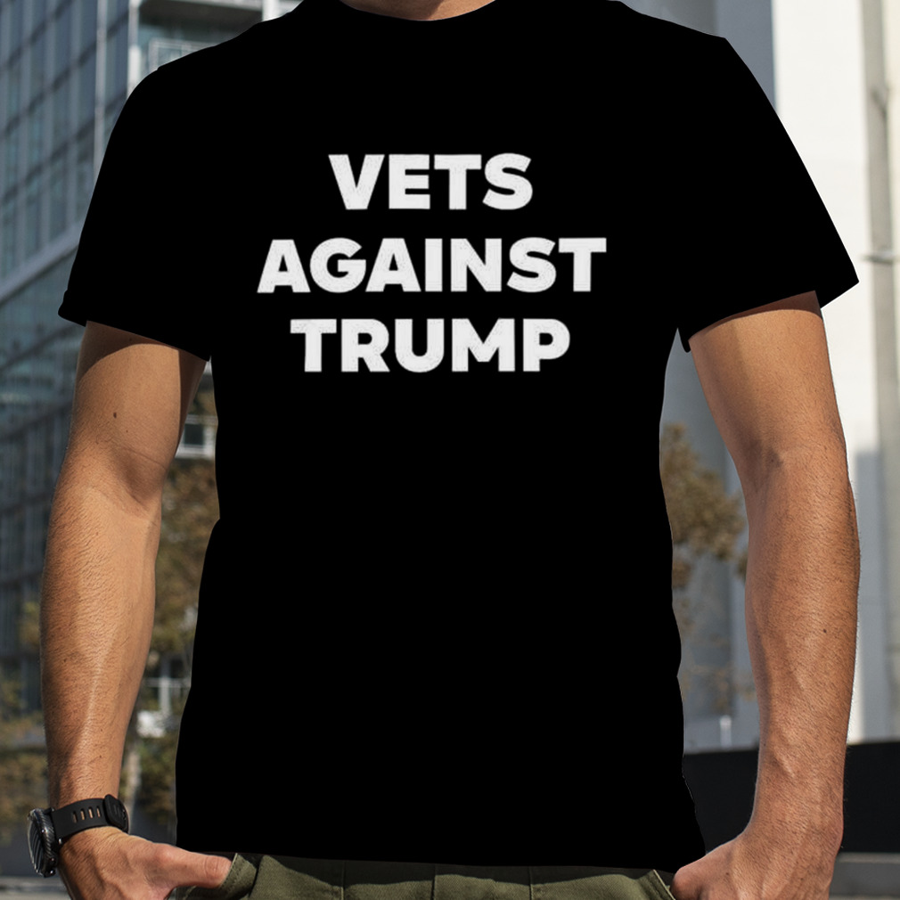 vest against Trump shirt