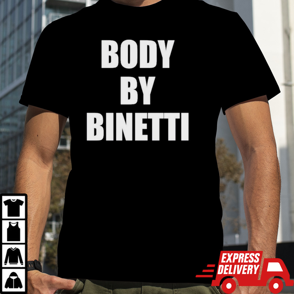 Dawn Staley wearing body by binetti shirt