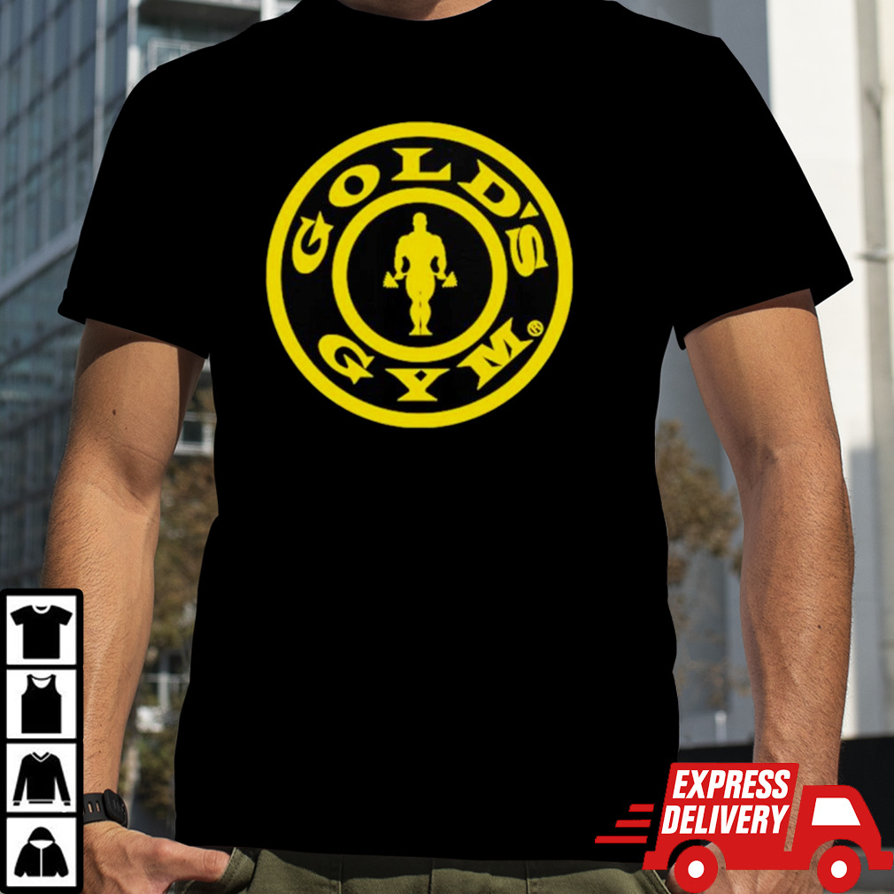 Drew McIntyre wearing gold’s gym logo shirt