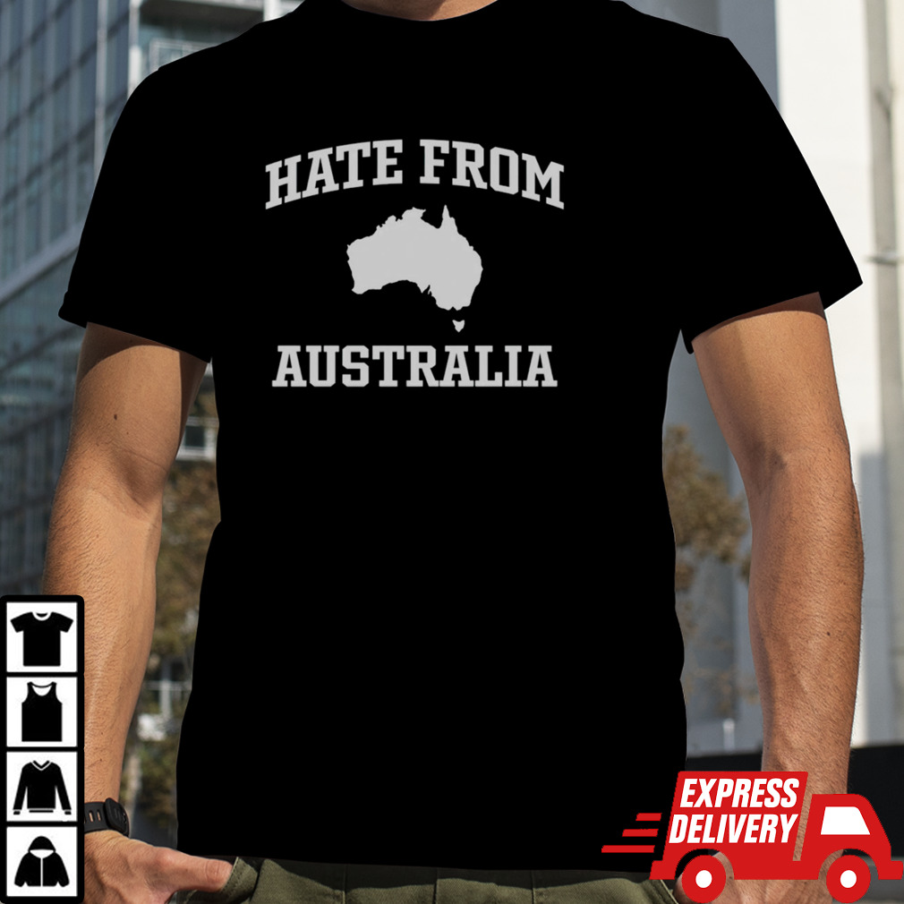 Tom Segura wearing hate from Australia shirt